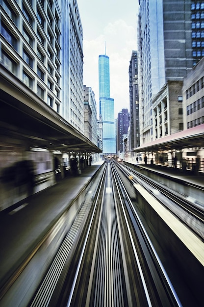 Photo railroad station in motion