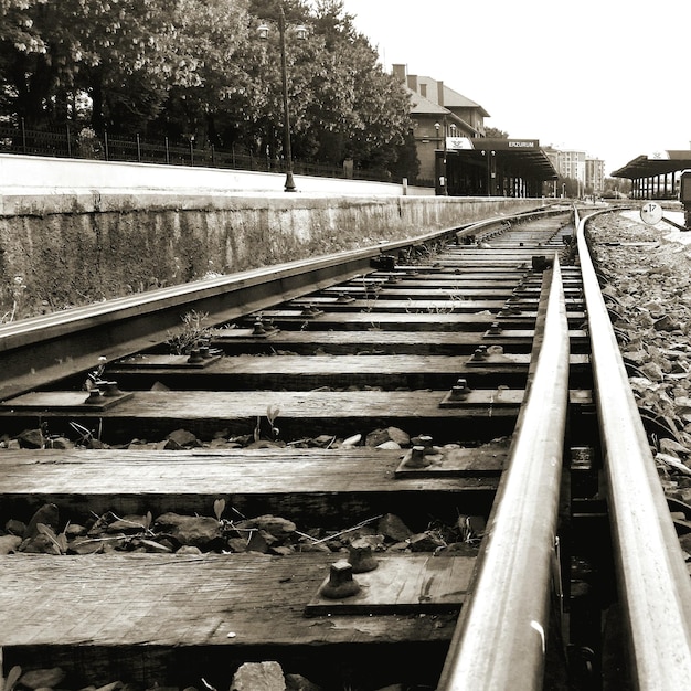 Photo railroad track at station