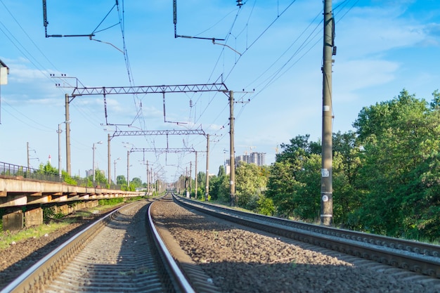 Railway rails leaving into the distance