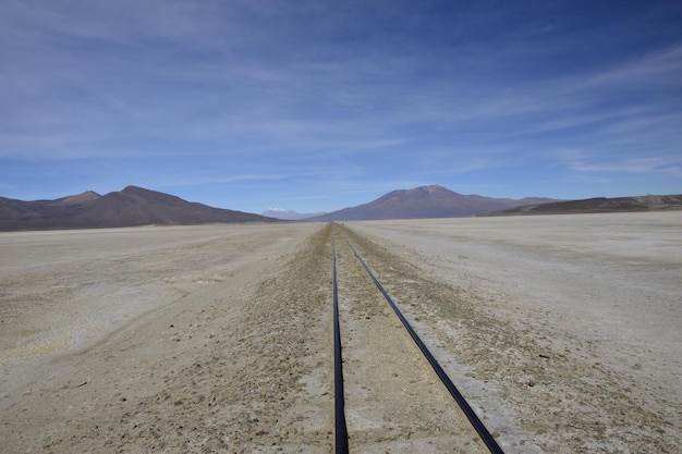 Railway rails on the territory of Salar de Uyuni Bolivia