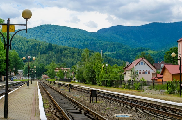 Railway station with a landing platform in the mountains in summer, Ukraine