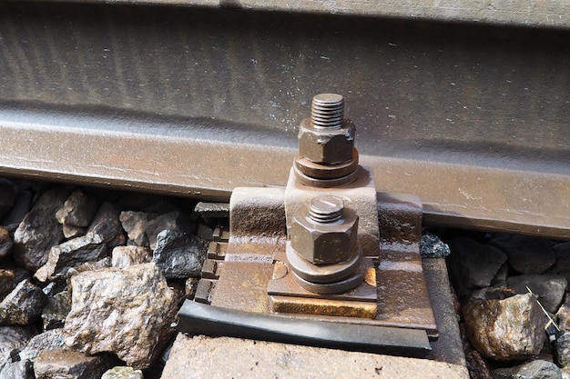 Railways Metal steel rails and wooden sleepers Rivets and fasteners on the railroad Stony backfill of railway tracks Station Nyrki Karelia