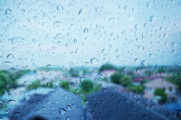 Rain drops on the glass surface.