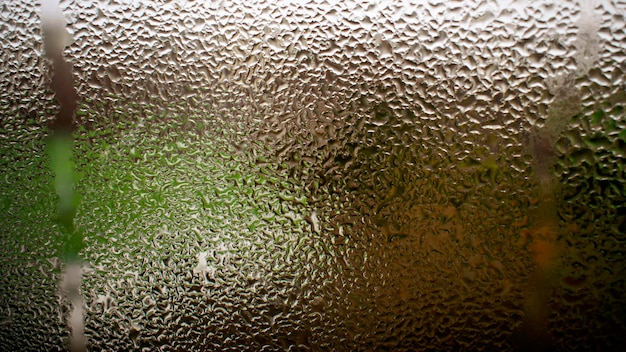 Rain Drops On Glass Textured Background.