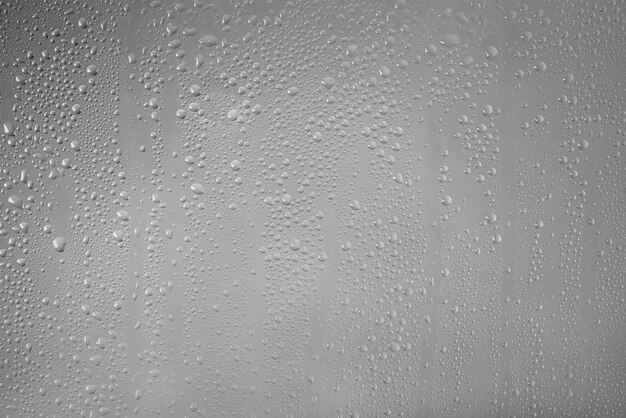 Rain drops pattern on window glass surface