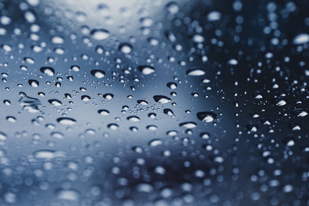 Photo rain drops  water drop in rainy season background