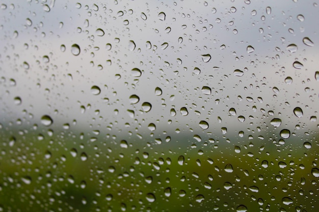 Rain drops on window glasses surface