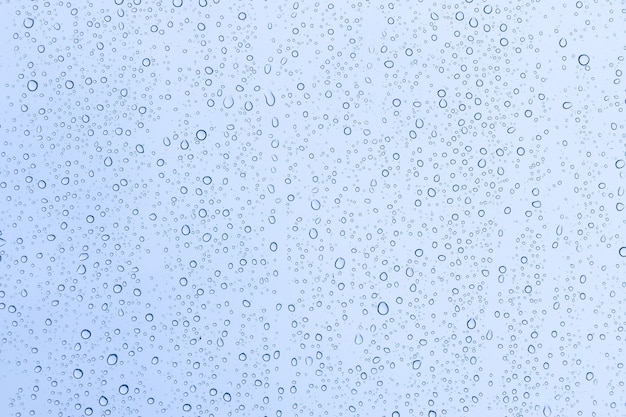 Rain drops on window glasses texture background