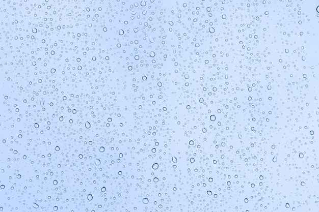 Rain drops on window glasses texture background