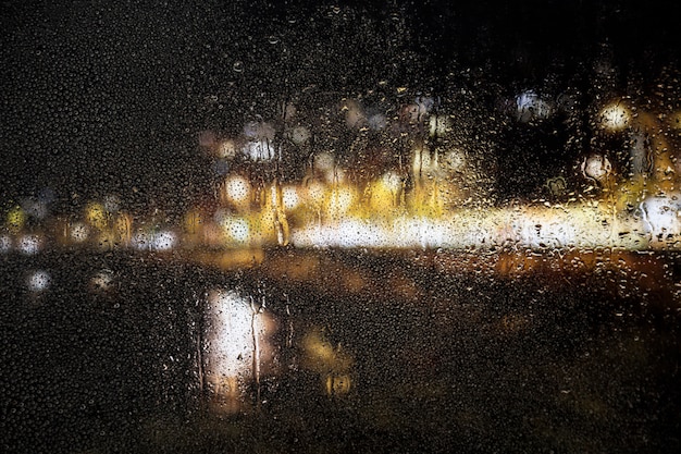 Rain effect on city night background