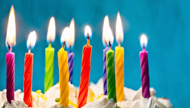 Rainbow birthday cake background with crainbow candles