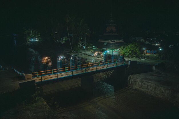 Photo the rainbow bridge or surau lamo bridge