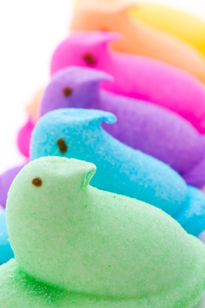 Rainbow color marshmallow peeps and jelly beans.