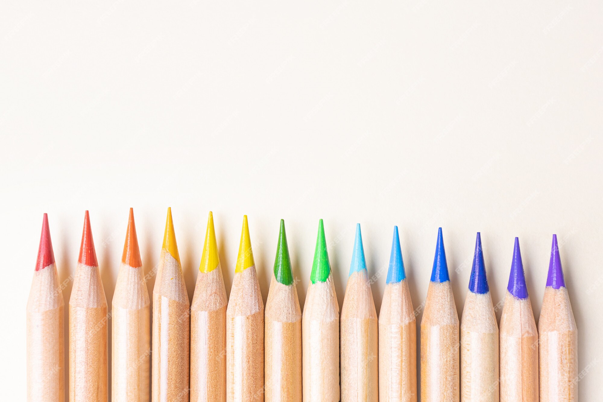 Premium Photo  A rainbow of colored pencils and markers on a dark  background