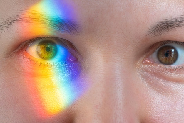 Rainbow color spectrum light on the face heart rainbow