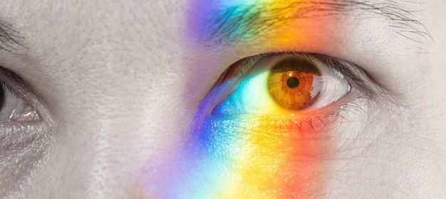 Rainbow color spectrum light on the face