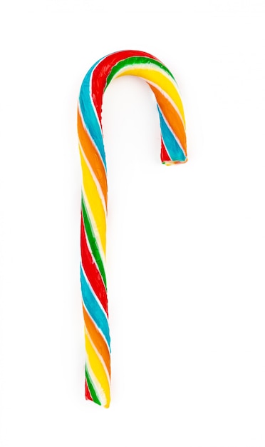 Rainbow colored candy cane isolated on white