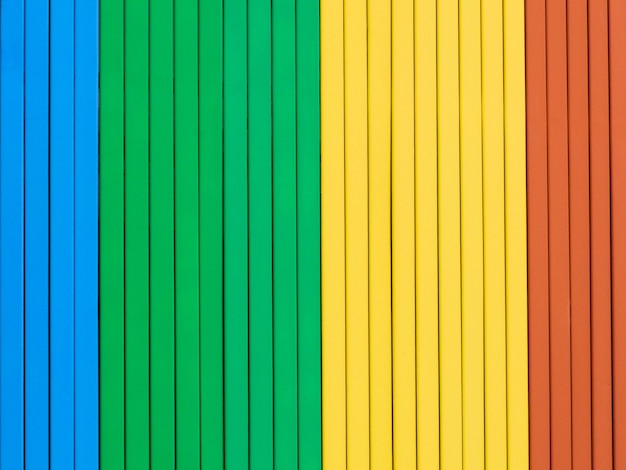 Rainbow colored wooden background