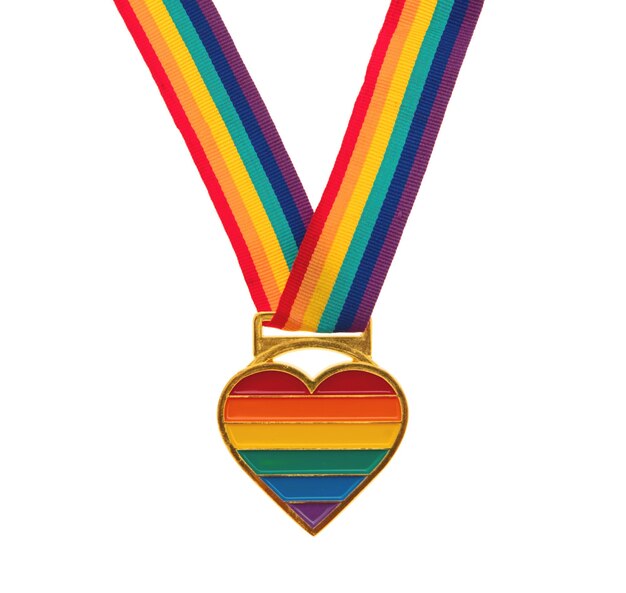 Photo rainbow colors ribbon and heart shape medal isolated on white transparent