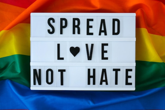 Rainbow flag with lightbox and text spread love not hate rainbow lgbtq flag made from silk material