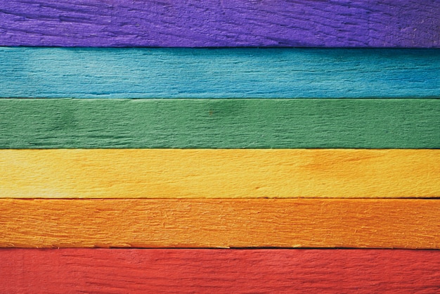 Photo rainbow flag wood plank texture background for design