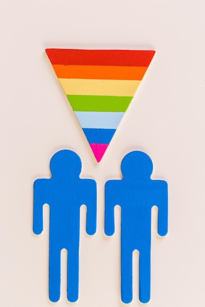 Rainbow gay pride male nad female cutouts on a white background