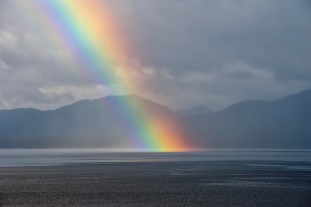 A rainbow going down on the Alaskan Sea