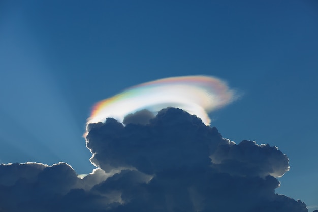 Rainbow light with Cumulonimbus clouds at dusk