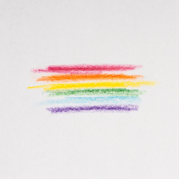 Photo rainbow lines drawing with pencils on gray background