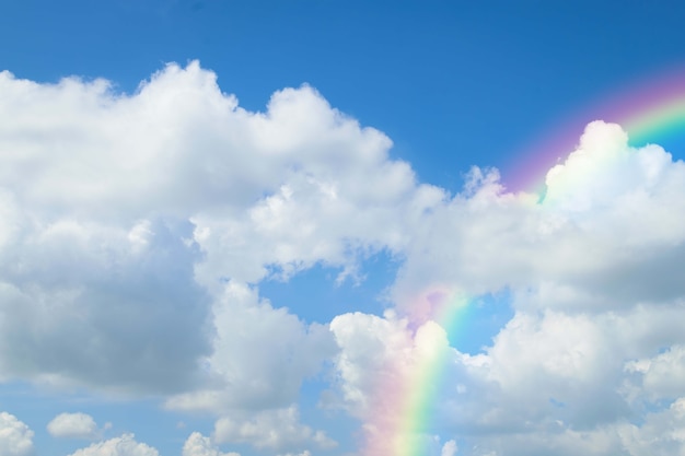 Rainbow of natural sky with blue sky and white clouds