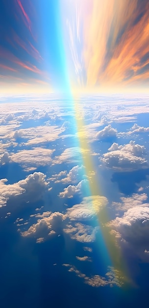 a rainbow in the sky above the clouds