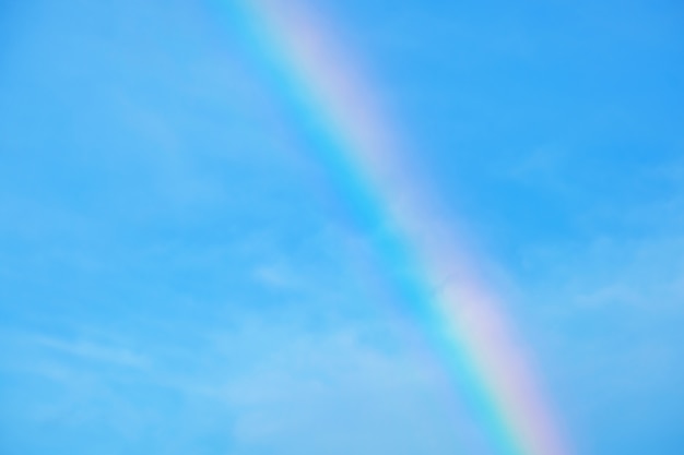 rainbows and blue sky background