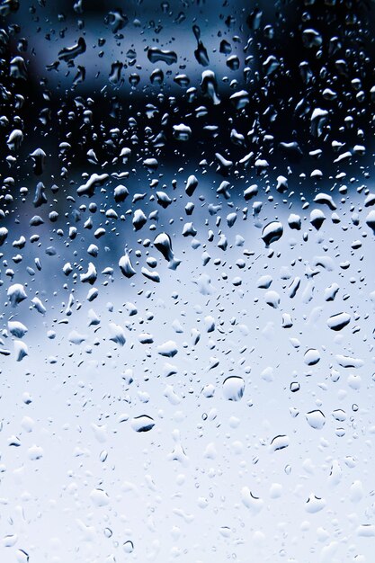 Raindrops on blue glass