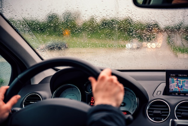 Raindrops on drivers windshield