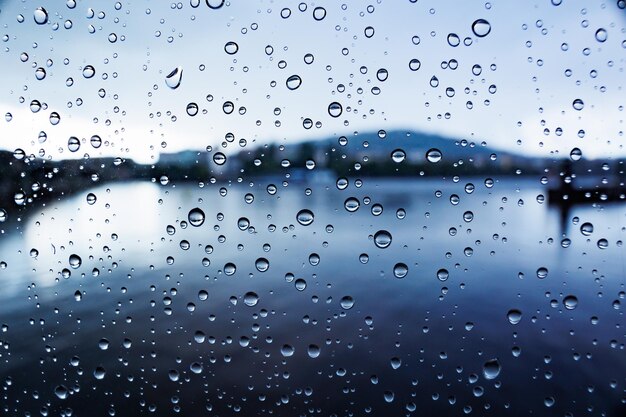 Photo raindrops on glass rain background abstract background