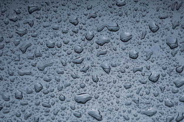 raindrops on the metallic surface in rainy days