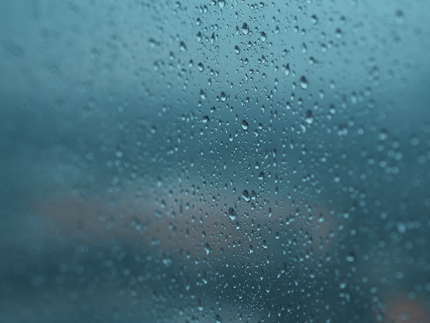 Raindrops of rainy season on the windows