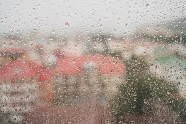 Raindrops run down the glass romantic mood of rainy weather