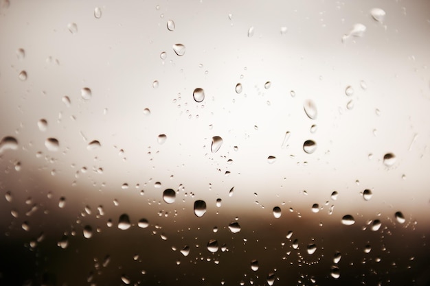 Raindrops on a window. Macro image, selective focus