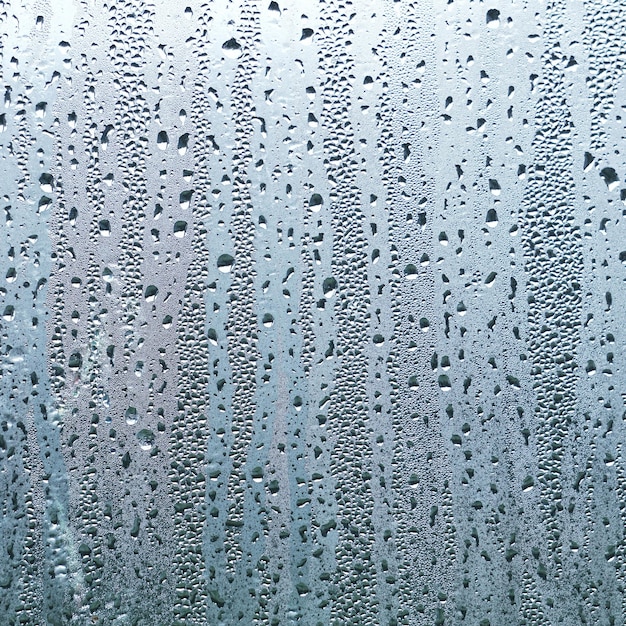 raindrops on the window in rainy days abstract background