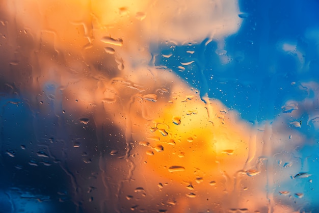 Raindrops on the windshield of a car