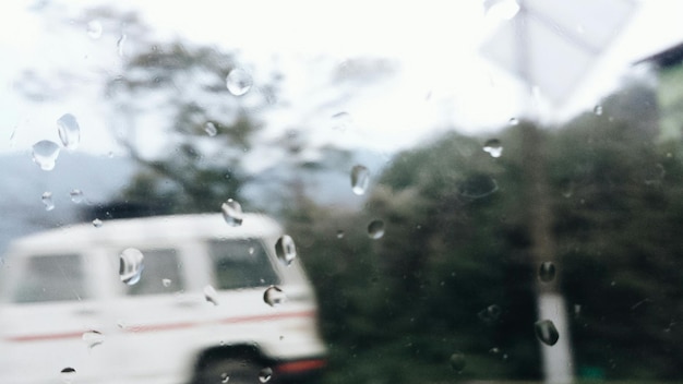 Photo raindrops on windshield of vehicle