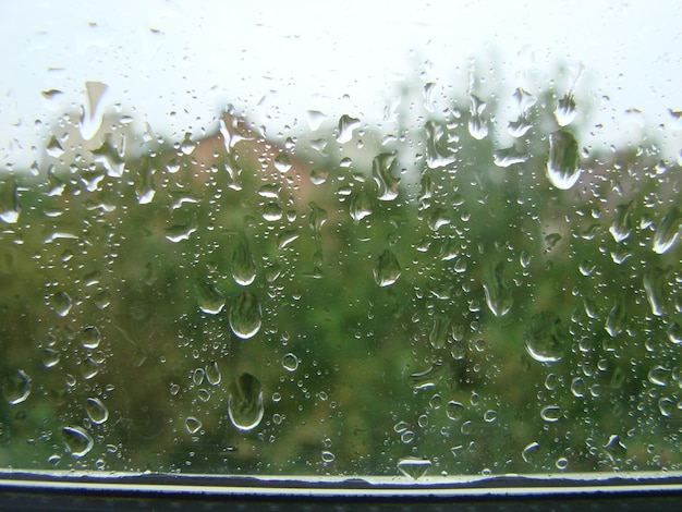 Rainy days rain drops on the window surface