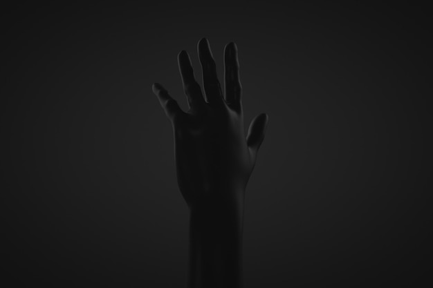 Photo raised hand dark hand on a dark background