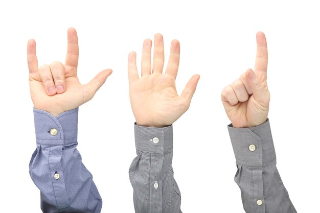 Raised hands of different men isolated.