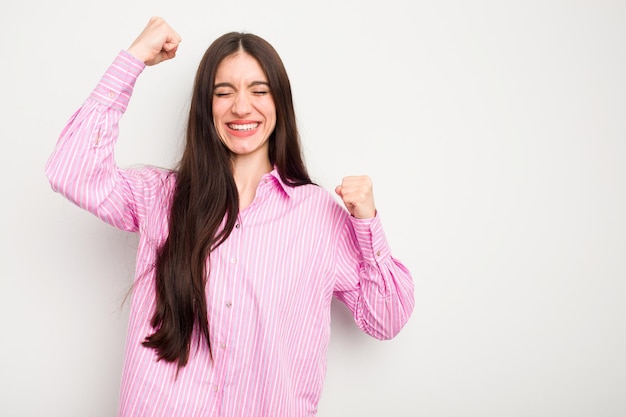 Raising fist after a victory winner concept