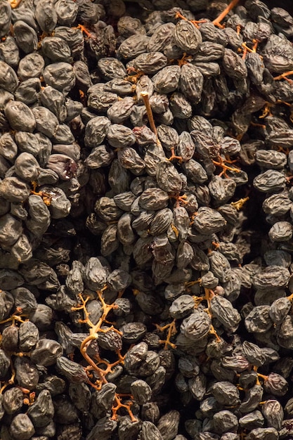 Фото Изюм в качестве фона текстура виноградного изюма