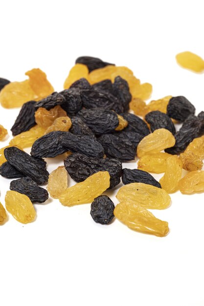 Raisins isolated on a white background.