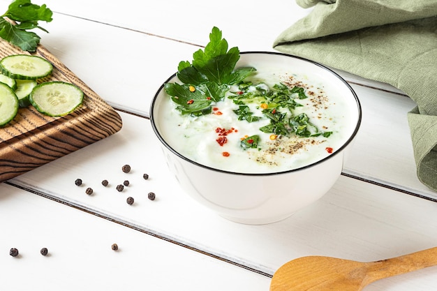 Raita indian cold side dish made with yoghurt and herbs