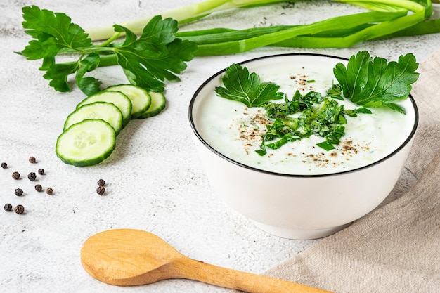 Raita indian cold side dish made with yoghurt and herbs